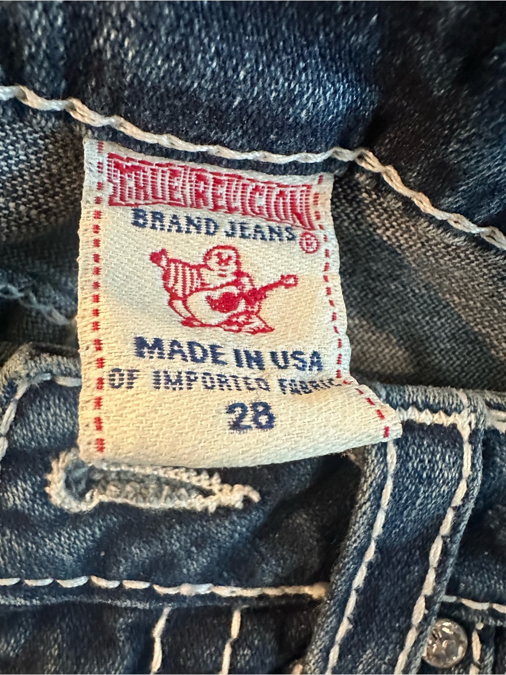 True Religion Distressed Dark Blue Jeans with Contrast Stitching
